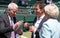 Retired players Pat Cash and John McEnroe being interviewed by Sue Barker on centre court before the start of the men`s finals.