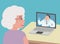 Retired senior elderly woman talking to male doctor via virtual telemedicine video call