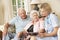 Retired Senior Woman Having Health Check With Nurse At Home