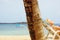 Retired woman sunbathing on the beach