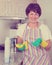 Retiree woman cleaning home