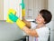 Retiree woman cleaning home