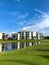 Retirement community condos on a resort golf course southwest Florida. Blue skies with water and lush green turf