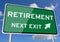 Retirement signpost roadsign next exit blue sky