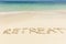 Retreat Text On Sand Near The Idyllic Sea At Beach