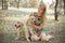 Retriever pup Lovely scene beautifull blond lady woman enjoy posing summer time vacation with best friend dog ivory white labrador