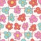 Retro 60s groovy psychedelic floral seamless pattern background. Cartoon hippie style bright flowers.