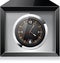 Retro analog clock in black box