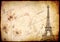 Retro background with Eiffel Tower and dry pressed flowers. Nostalgic backdrop with old vintage paper texture