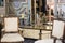 Retro baroque room. Antique design room with clock and beautiful armchairs. Antique furniture