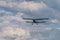 Retro biplane in dramatic skies