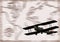 Retro biplane flying over world map