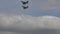 Retro biplanes fighter aircraft of Royal Navy flight in formation in cloudy sky