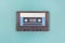 Retro black blue plastic audio cassette tape.