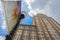 Retro Building downtown -   Perspective looking up  with pretty skies and a Tulsa flag on a lamppost