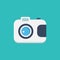 Retro Camera white vector icon on teal blue background.