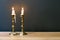 Retro Candelabra With Burning Candles In Minimalist Room