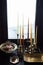 Retro Candelabra with Candles on wooden surface