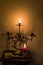 Retro candlesticks with candles on wooden table