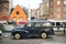 Retro car on the background of multicolored buildings on Christianshavns canal in Copenhagen, Denmark. February 2020