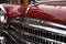 retro cars shiny chrome grill with water droplets