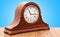 Retro chimes mantle clock, shelf clock on the wooden table. 3D r