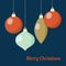Retro Christmas greeting card, invitation. Hanging Christmas balls. Flat design. Vector illustration background.