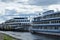 Retro cruise liners motor ships in the river port of the city of Kostroma. The Volga River. Blue sky