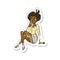 retro distressed sticker of a cartoon attractive woman sitting thinking