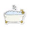 retro distressed sticker of a cartoon bathtub