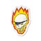 retro distressed sticker of a cartoon flaming pirate skull