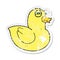 retro distressed sticker of a cartoon funny rubber duck