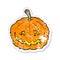 retro distressed sticker of a cartoon grinning pumpkin