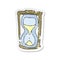 retro distressed sticker of a cartoon hourglass