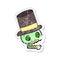 retro distressed sticker of a cartoon laughing skull in top hat