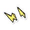 retro distressed sticker of a cartoon lightning bolt doodles