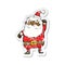 retro distressed sticker of a cartoon santa claus punching air