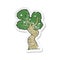 retro distressed sticker of a cartoon twisted old tree