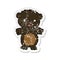 retro distressed sticker of a frightened black bear cartoon