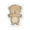 retro distressed sticker of a frightened teddy bear cartoon