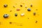 Retro electronic components isolated in yellow background, concept