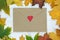 Retro envelope with red heart surrounded by autumn leaves. Template. Backdrop. Mock up