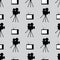 Retro film industry seamless pattern. Repetitive vintage TVs and camcorders. Seamless pattern. Black, white, gray.