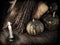 Retro grunge still life with with broom stick, candle and pumpkins_1