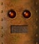 Retro grungy rusty robot face