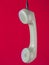 Retro handset on red background. Minimalist trend.