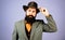 Retro handsome man, portrait face of serious bearded hipster with vintage hat. Vintage fashion vogue.