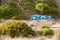 Retro hippie camper at Zavial beach in Portugal