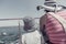 Retro image of child and woman on boat deck during summer vacations