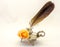 Retro inkwell feather writing pen and an orange rose